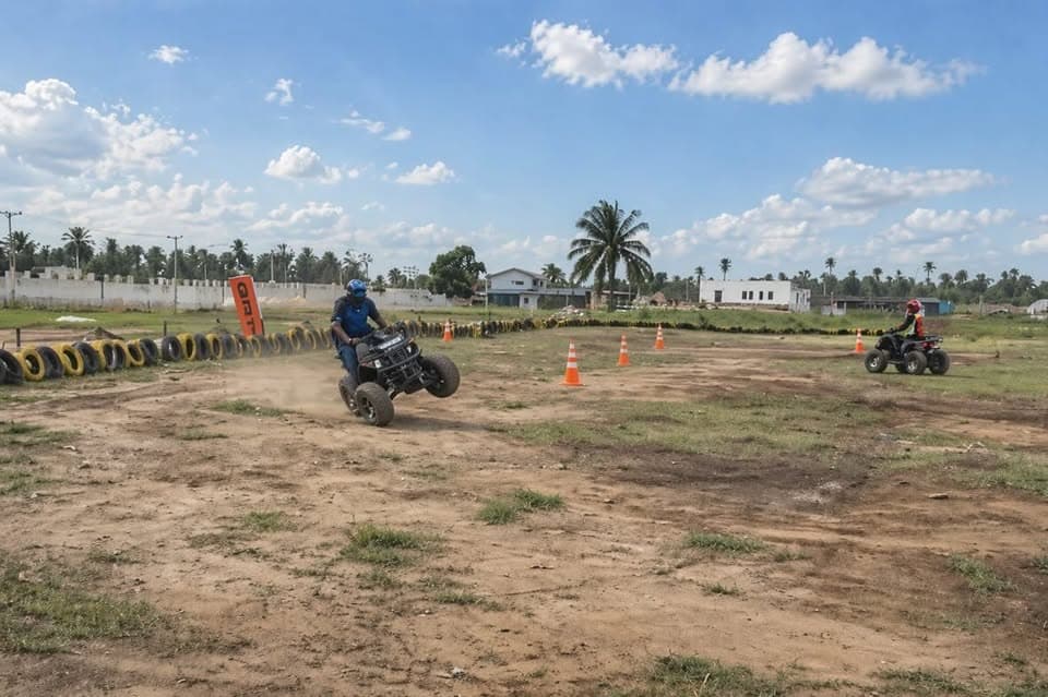 Rider performing a wheelie at GRIT Quad Biking Arena